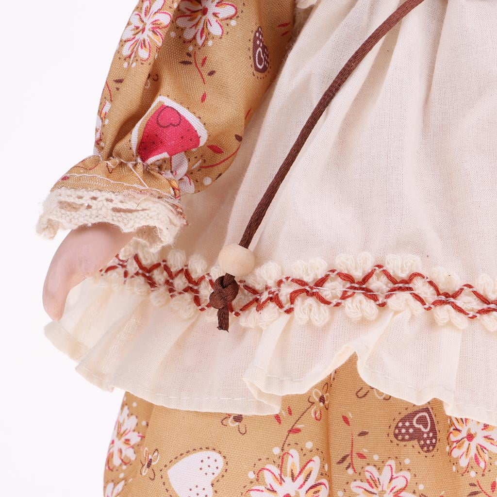 30cm Porcelain Girl Doll Figure with Yellow Clothes N86505